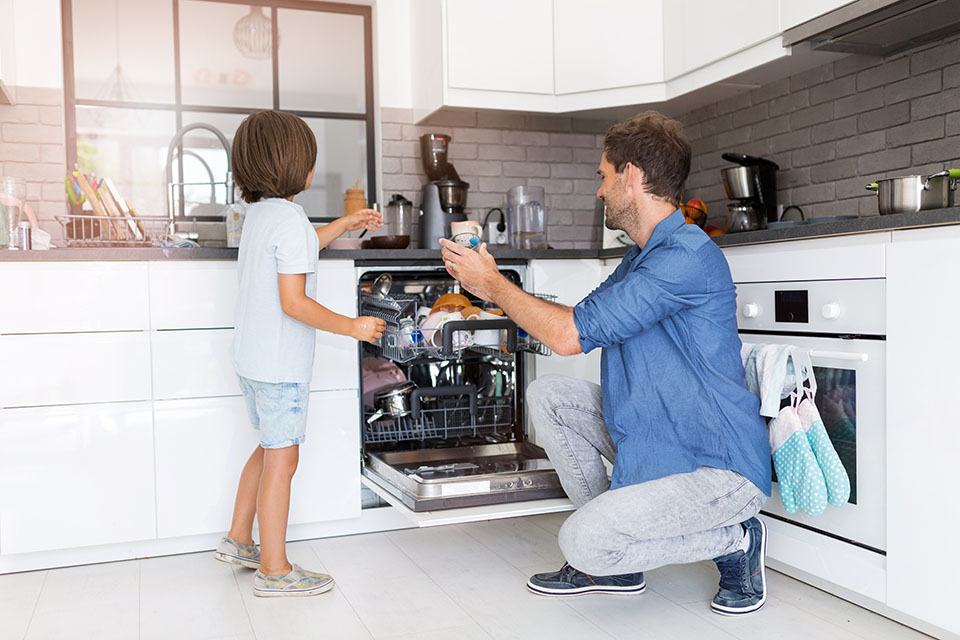 a loaded dishwasher with spotless dishes that is ready to be emptied